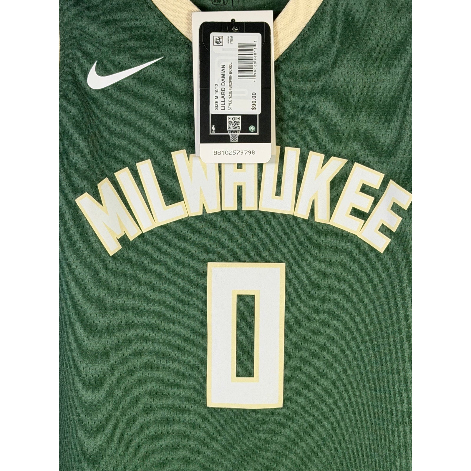 Nike Milwaukee Bucks Damian Lillard #0 youth swingman jersey in green, front view showing team logo and player number.