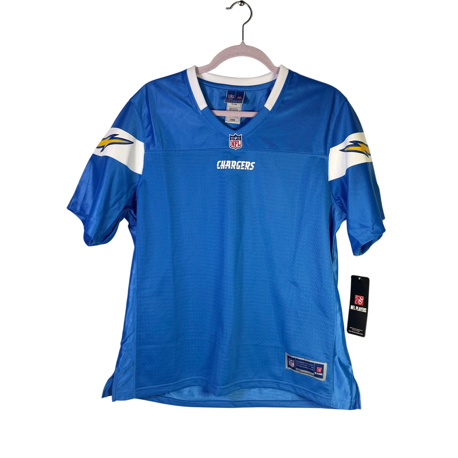 NFL Players Los Angeles Chargers women's blue football jersey, size L, new with tags, featuring team logo and design details.