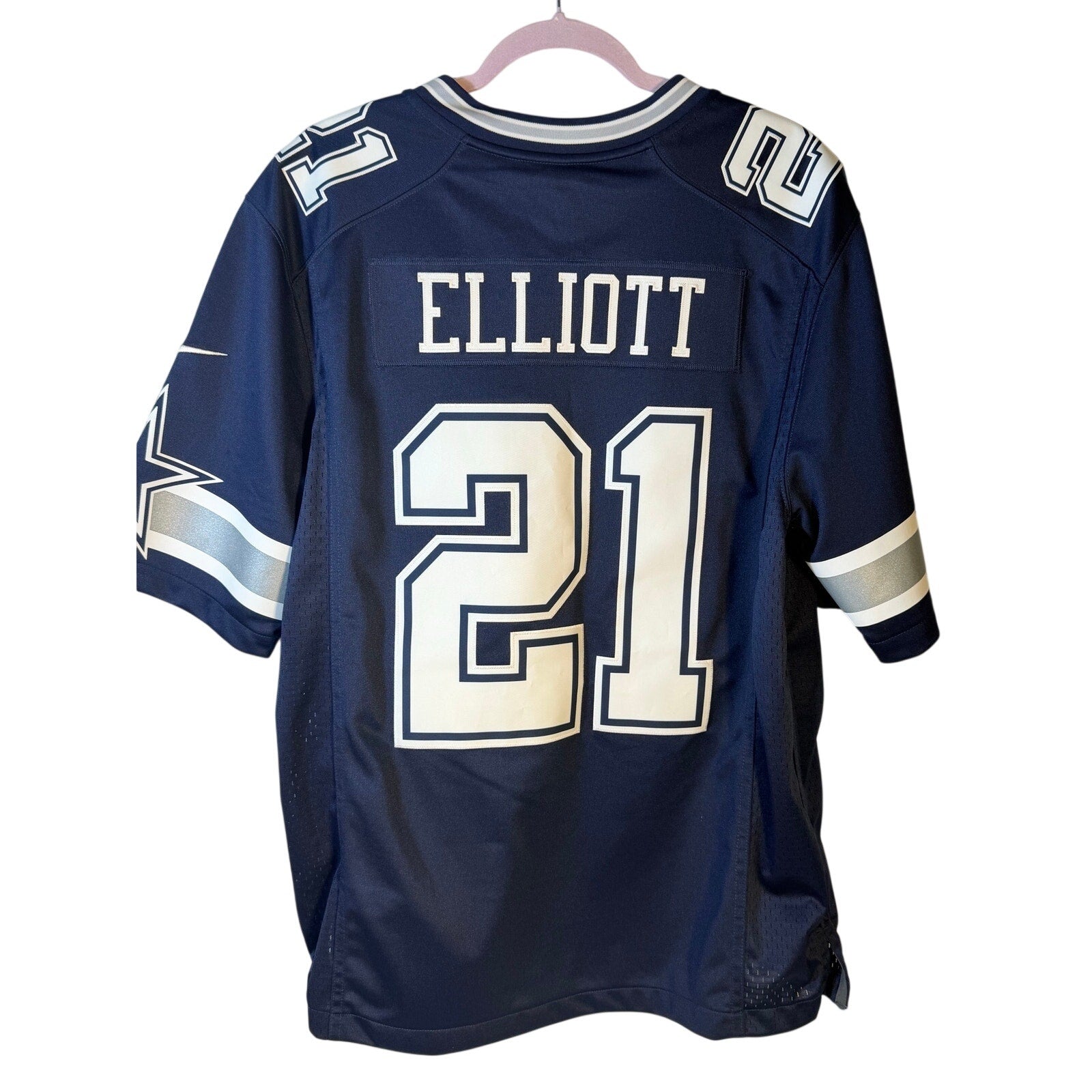 Nike Dallas Cowboys Ezekiel Elliott #21 NFL game jersey for men, large navy with team and player details visible.