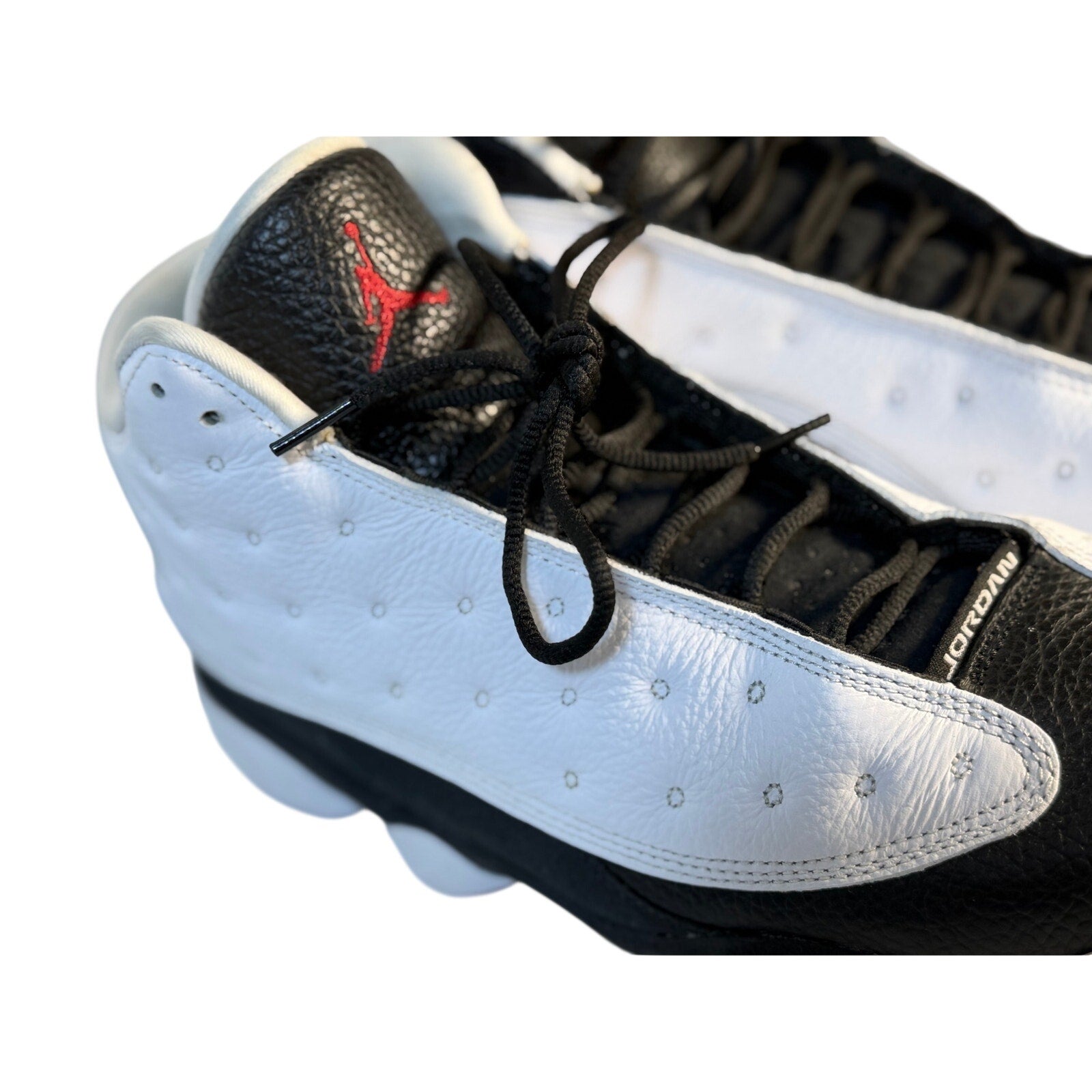 Black and white Air Jordan 13 Retro He Got Game athletic sneakers for men, US size 11.5, with signature design details.