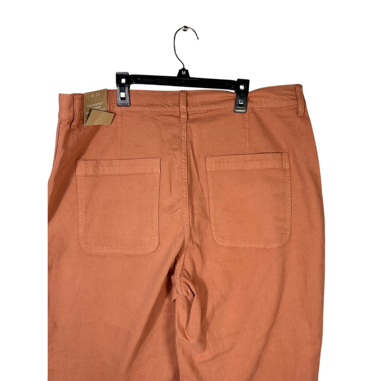 Madewell The Perfect Vintage wide-leg crop pants in terracotta color, size 33, showing the relaxed fit and cropped style.