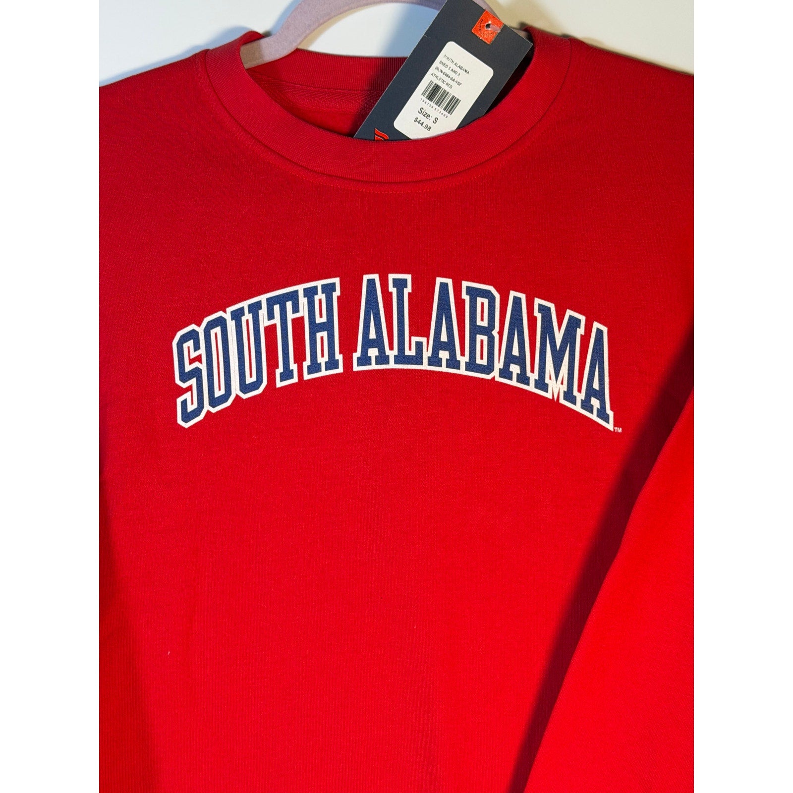 Men's red South Alabama Jaguars crewneck sweatshirt by LEAGUE, new with tags, showing the front view with team logo and design.