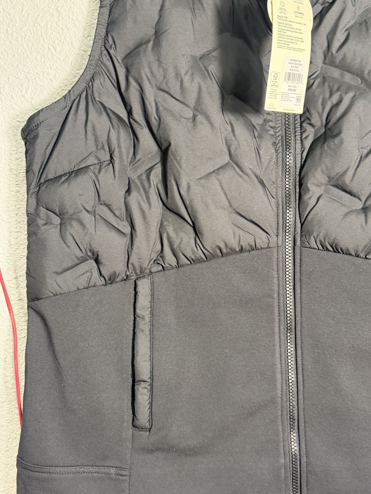 Black women's CALIA Cold Dash Run Vest in XXL, lightweight activewear vest with a sleek, fitted design for running and outdoor activities.