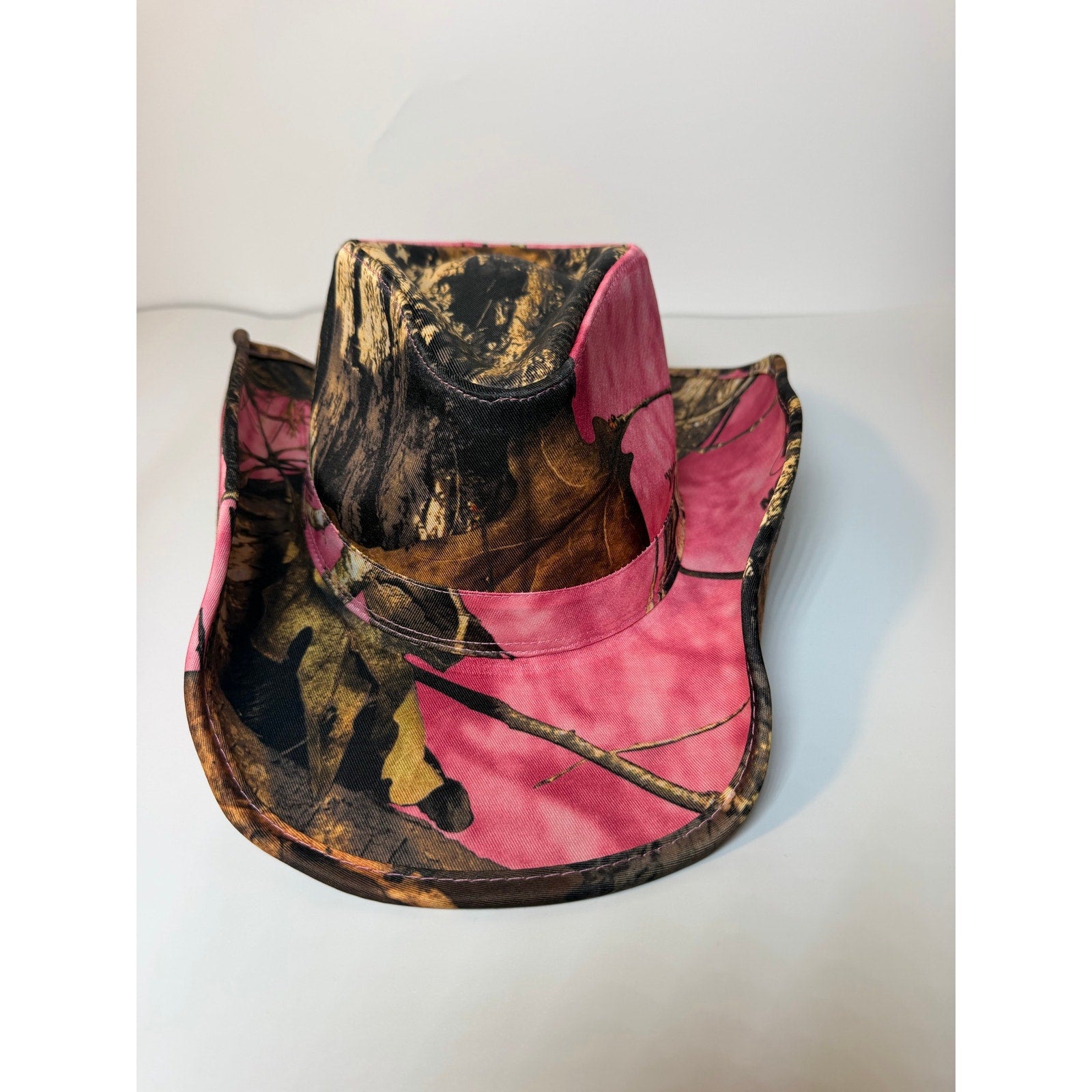 Peter Grimm women's pink camo Western cowboy hat with snap-up brim, Mossy Oak pattern and stylish western design.