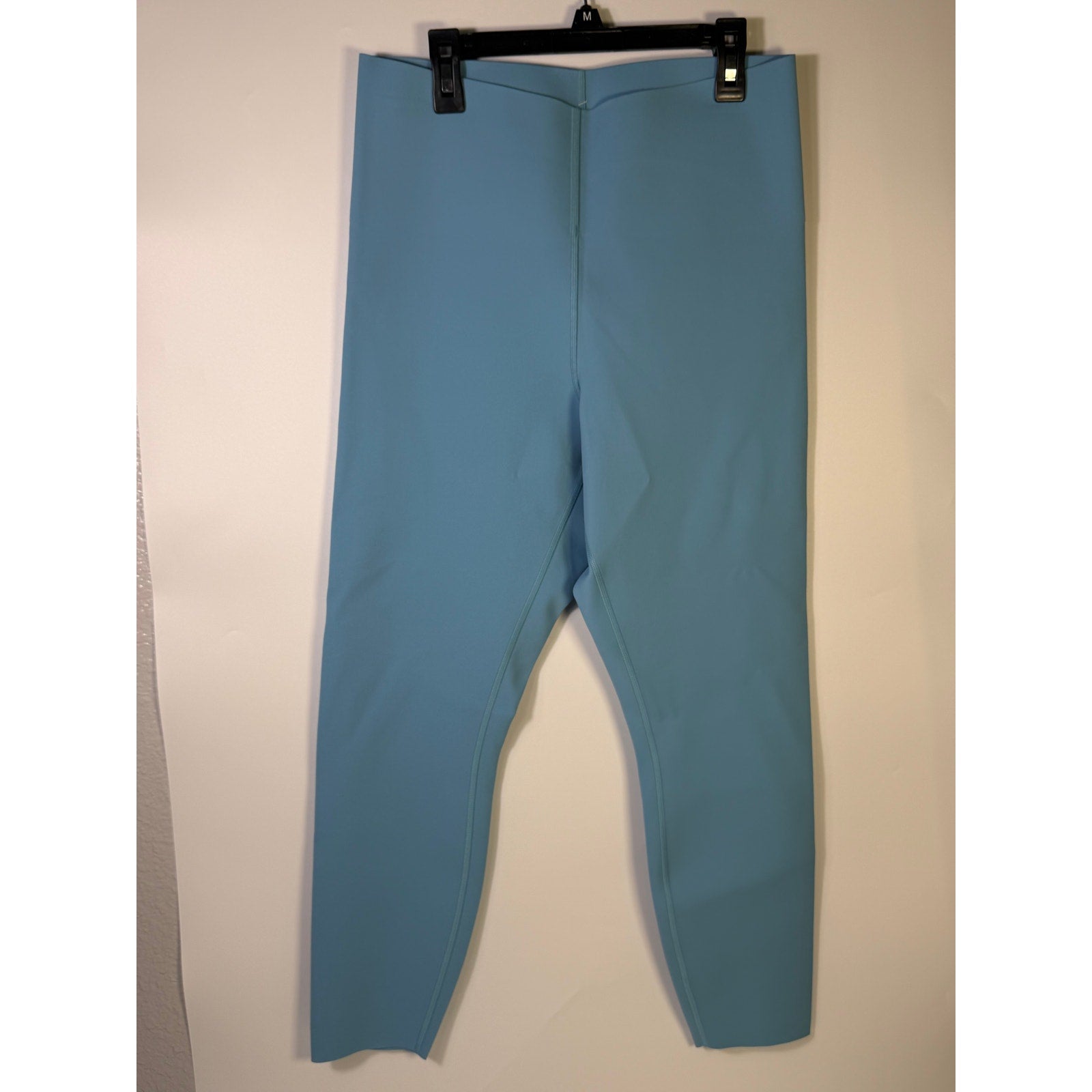 Lululemon Glow Up HR Tight 25-inch women's leggings in Windmill Blue, featuring a fitted high-rise design and stretchy fabric.