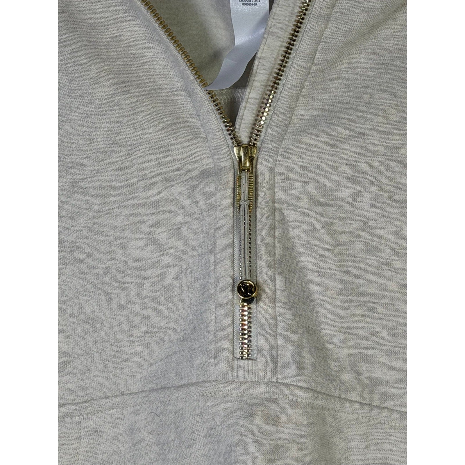 Lululemon Scuba oversized half-zip hoodie in heathered cream, size XL/XXL, showing front view of the cozy, relaxed fit hoodie.