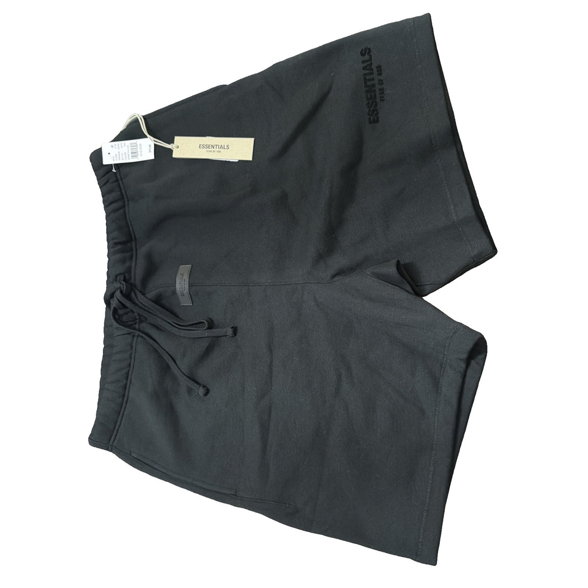 Black Essentials Fear of God fleece sweat shorts for men in size XL, shown laid flat with drawstrings and relaxed fit.