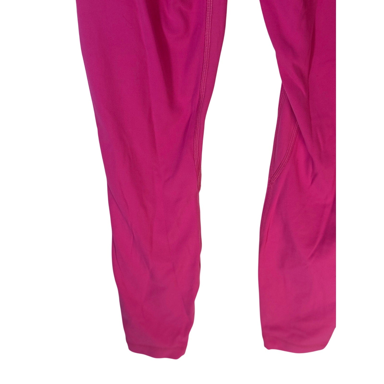 Pink Lululemon Wunder Under high-rise leggings for women, athletic pants with a snug fit and comfortable waistband.
