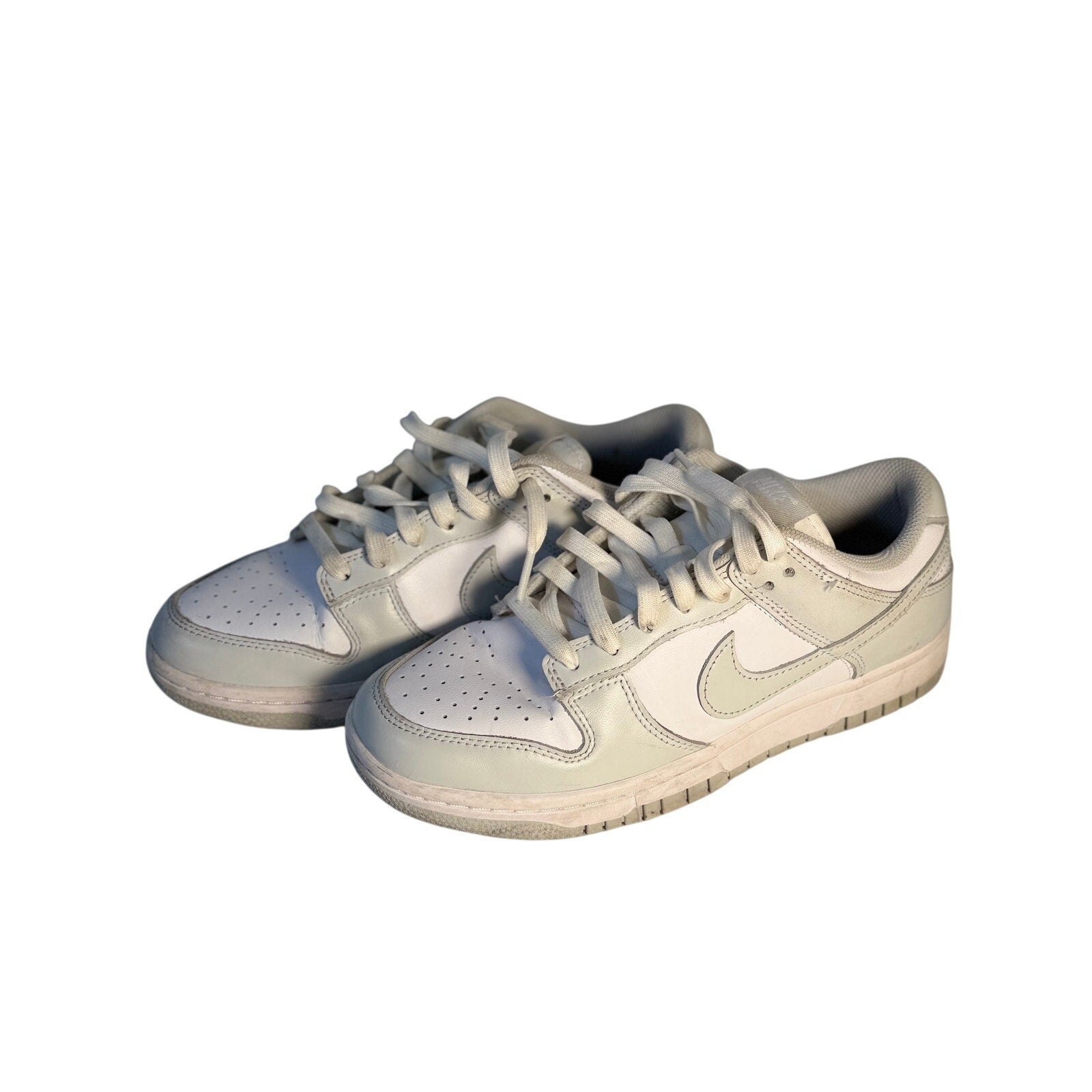 Nike Dunk Low Triple White sneakers for men, size 7.5, white leather casual shoes with a classic low-top design.