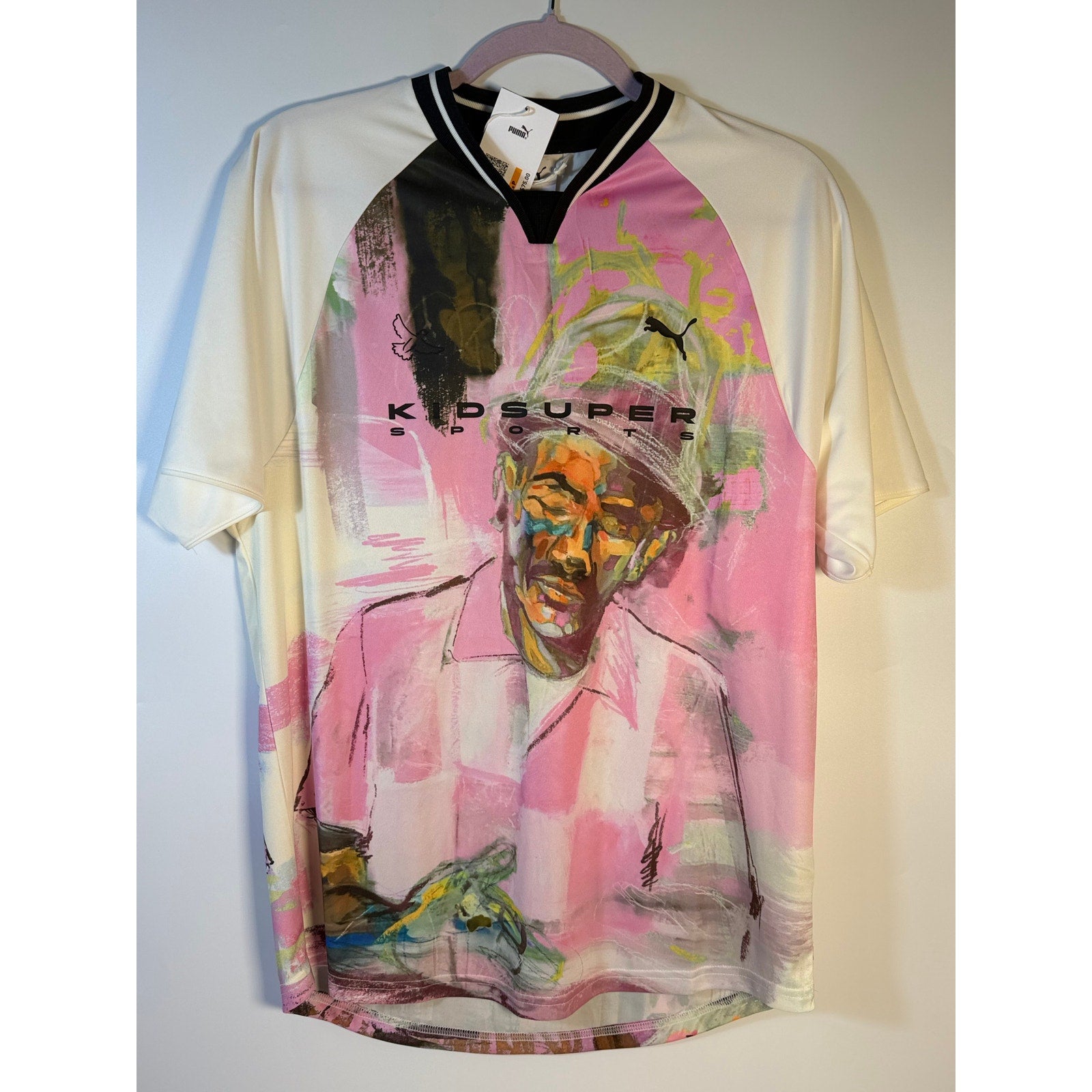 PUMA x KidSuper white graphic men's soccer jersey T-shirt with bold design, size small, front view.