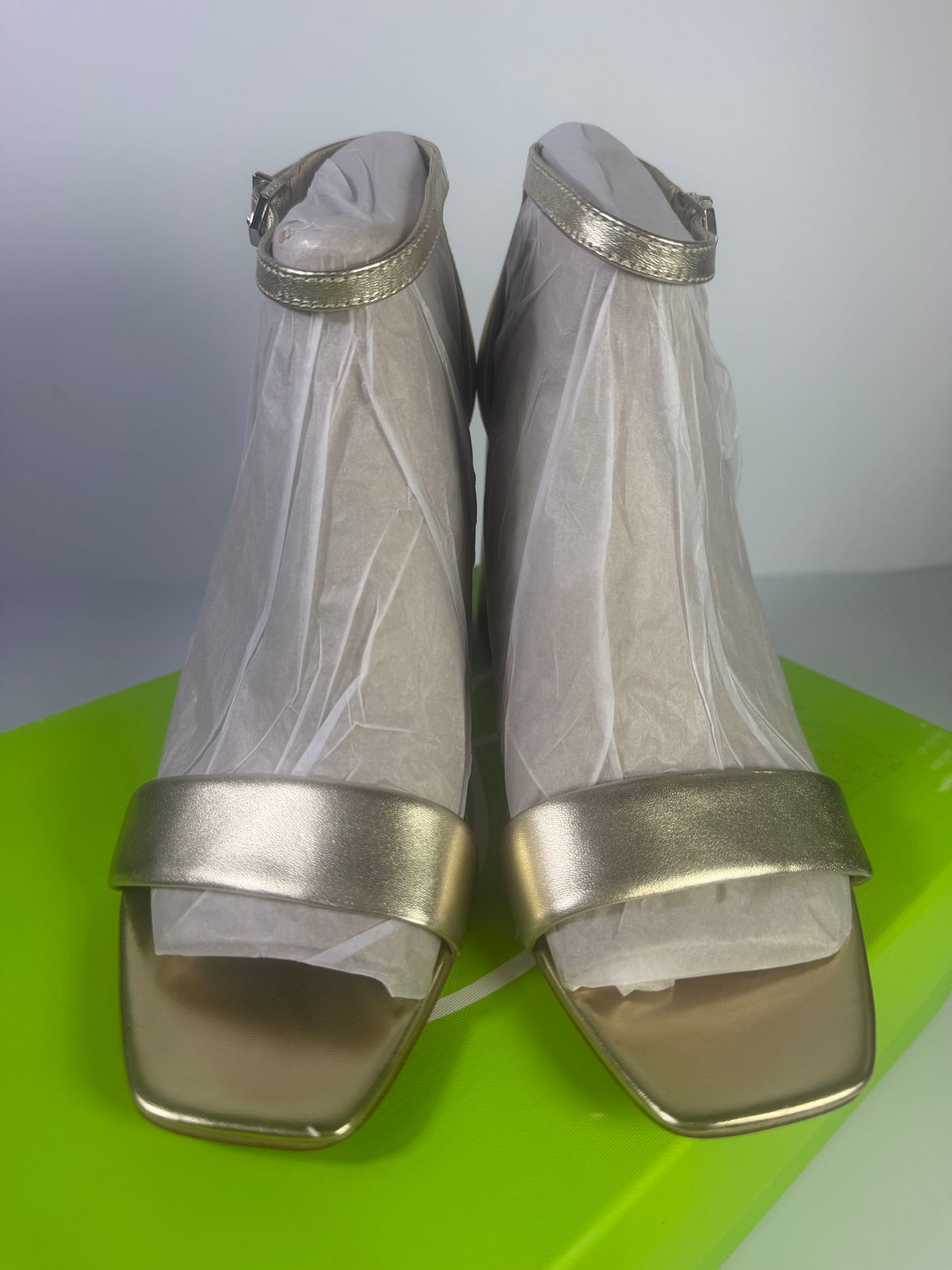 Sam Edelman women's gold metallic block heel ankle strap sandals, size 9.5, featuring a stylish design and ankle strap detail.
