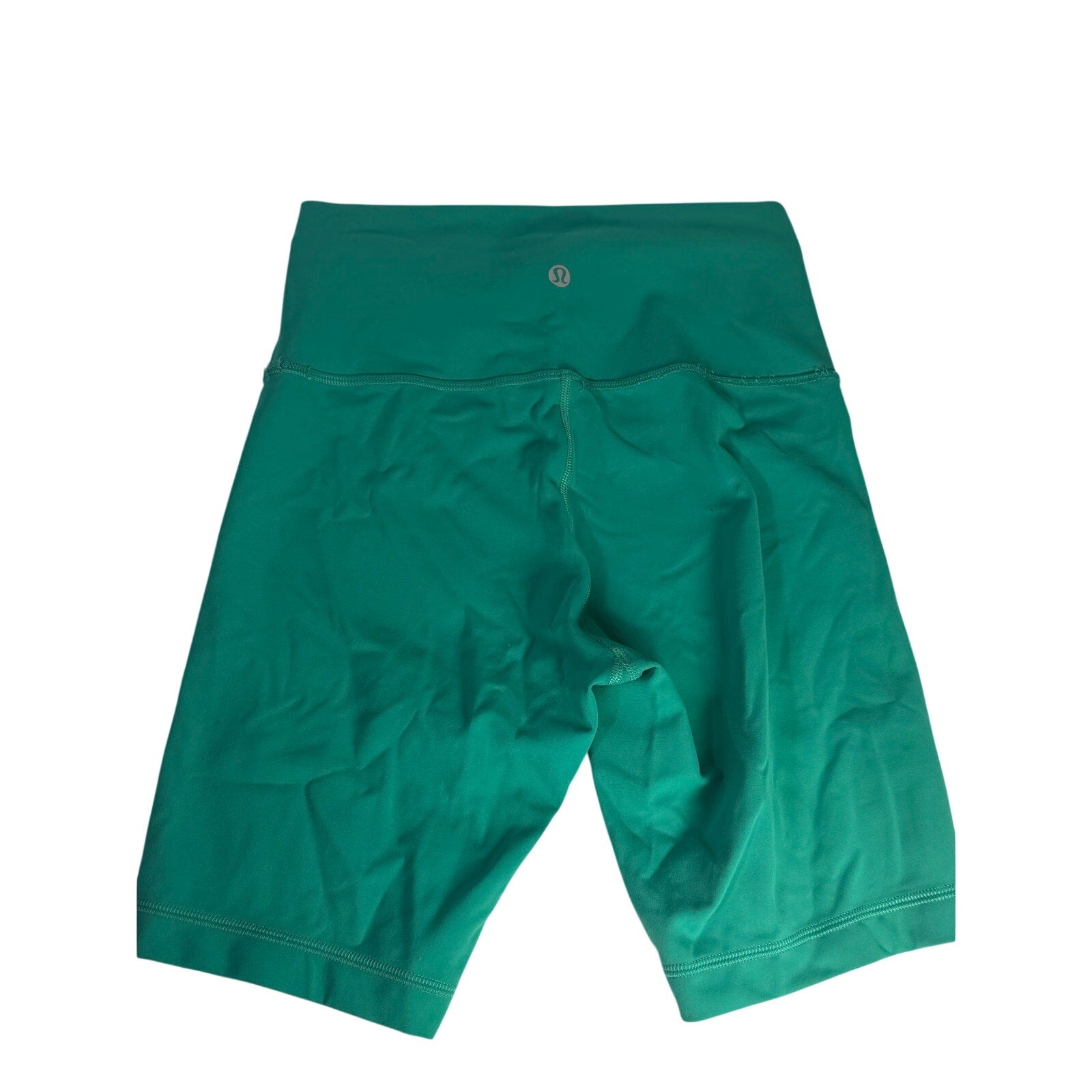 Lululemon women's teal green high-rise biker shorts, size 6, with a fitted waistband and smooth athletic fabric.