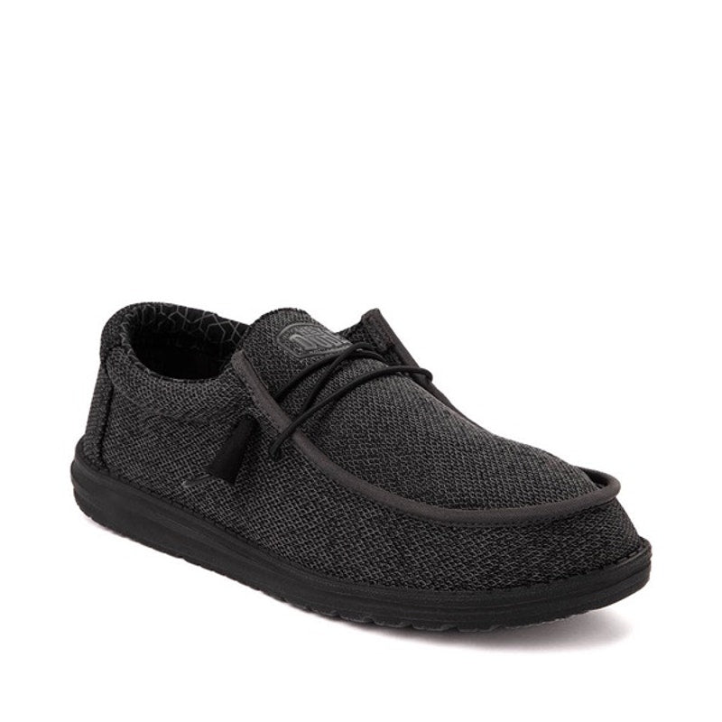 Hey Dude Wally Sox Micro men's slip-on shoes in total black, comfortable casual slip-ons with breathable fabric.