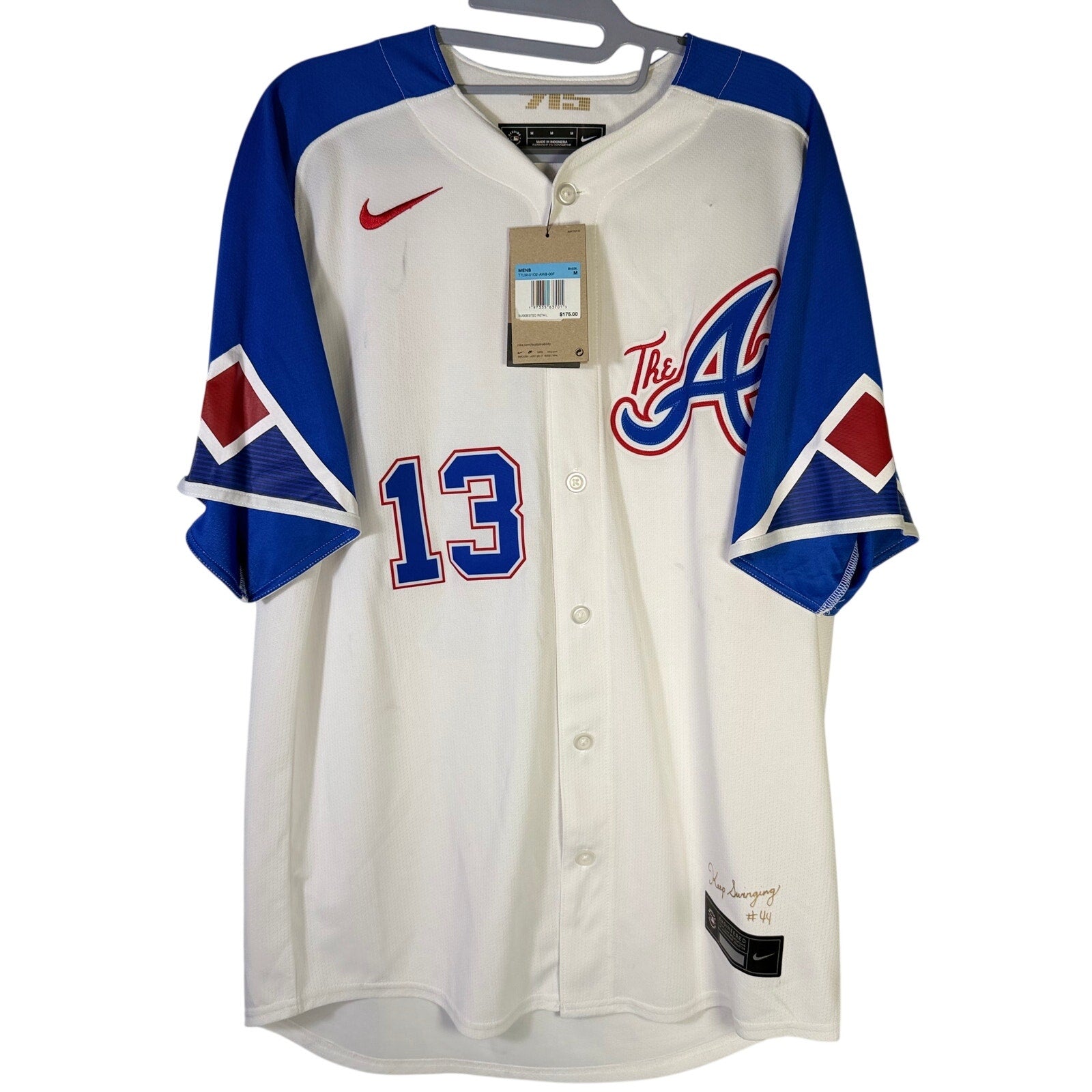Nike Atlanta Braves Ronald Acuña Jr. #13 MLB jersey for men in medium size, featuring team logo and player details.