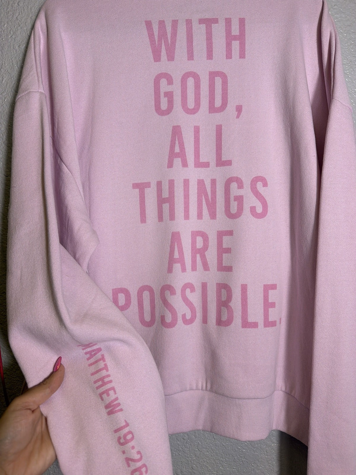 Pink Christian crewneck sweatshirt for women by Kind Regards with inspirational "With God All Things Are Possible" print, size M.