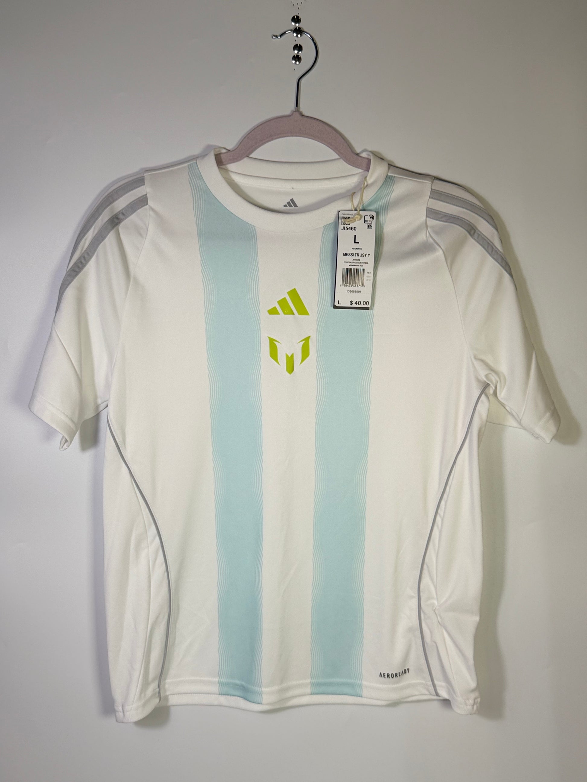 White Adidas Messi training jersey, men's size large, lightweight athletic football shirt with team logo and breathable fabric.