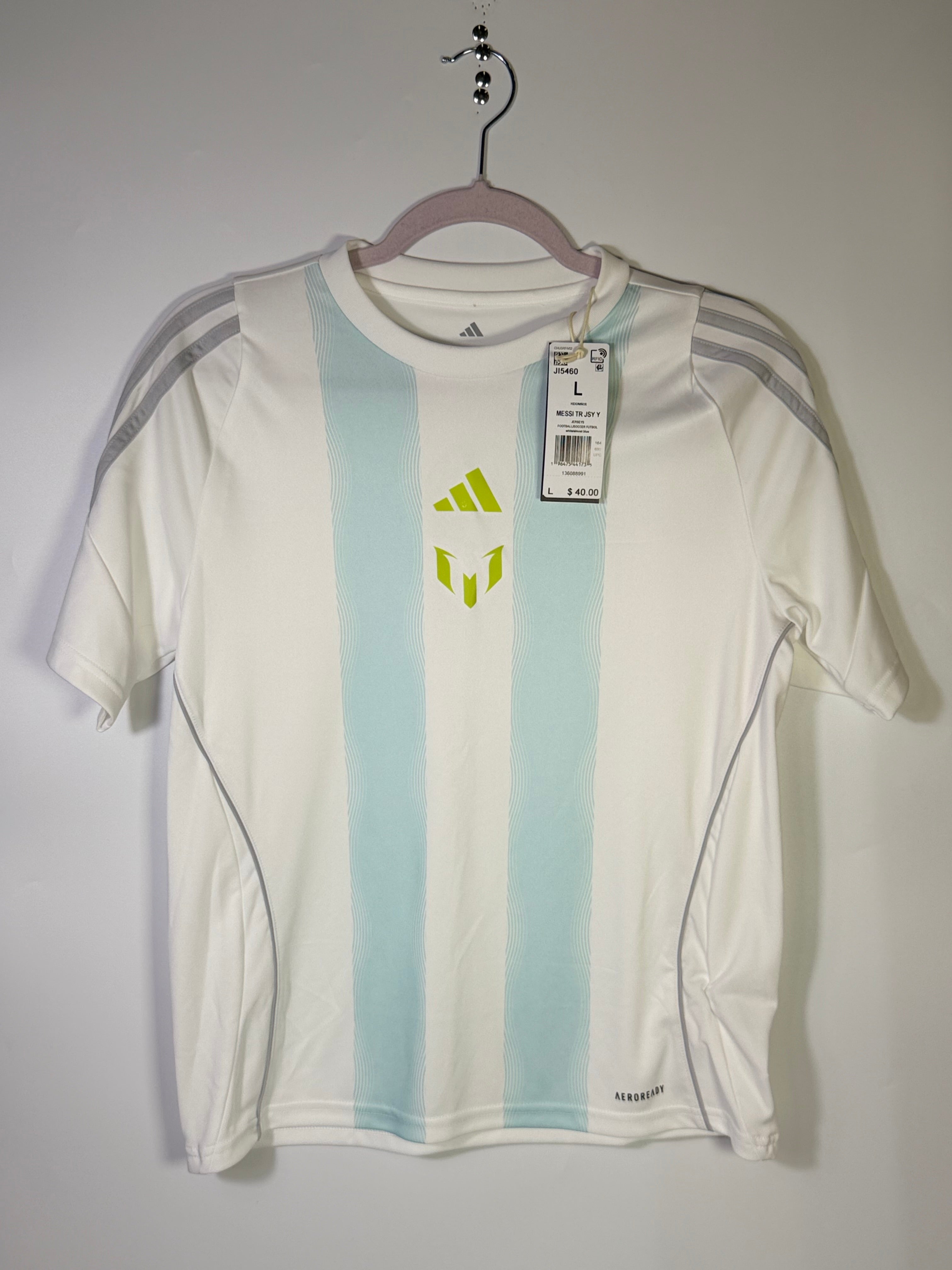 White Adidas Messi training jersey, men's size large, lightweight athletic football shirt with team logo and breathable fabric.