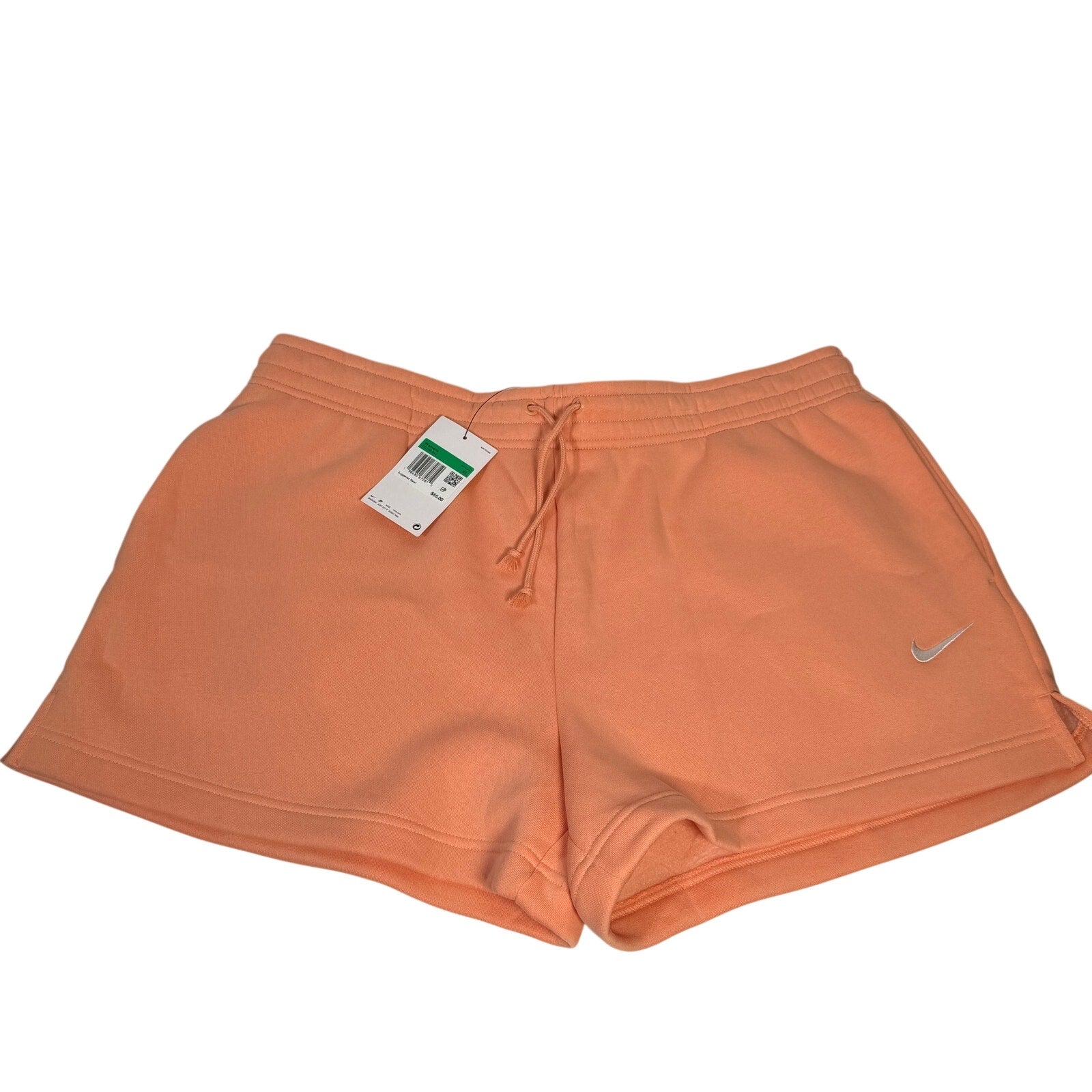 Nike women's peach orange fleece drawstring shorts with side pockets, size XL, casual athletic style.