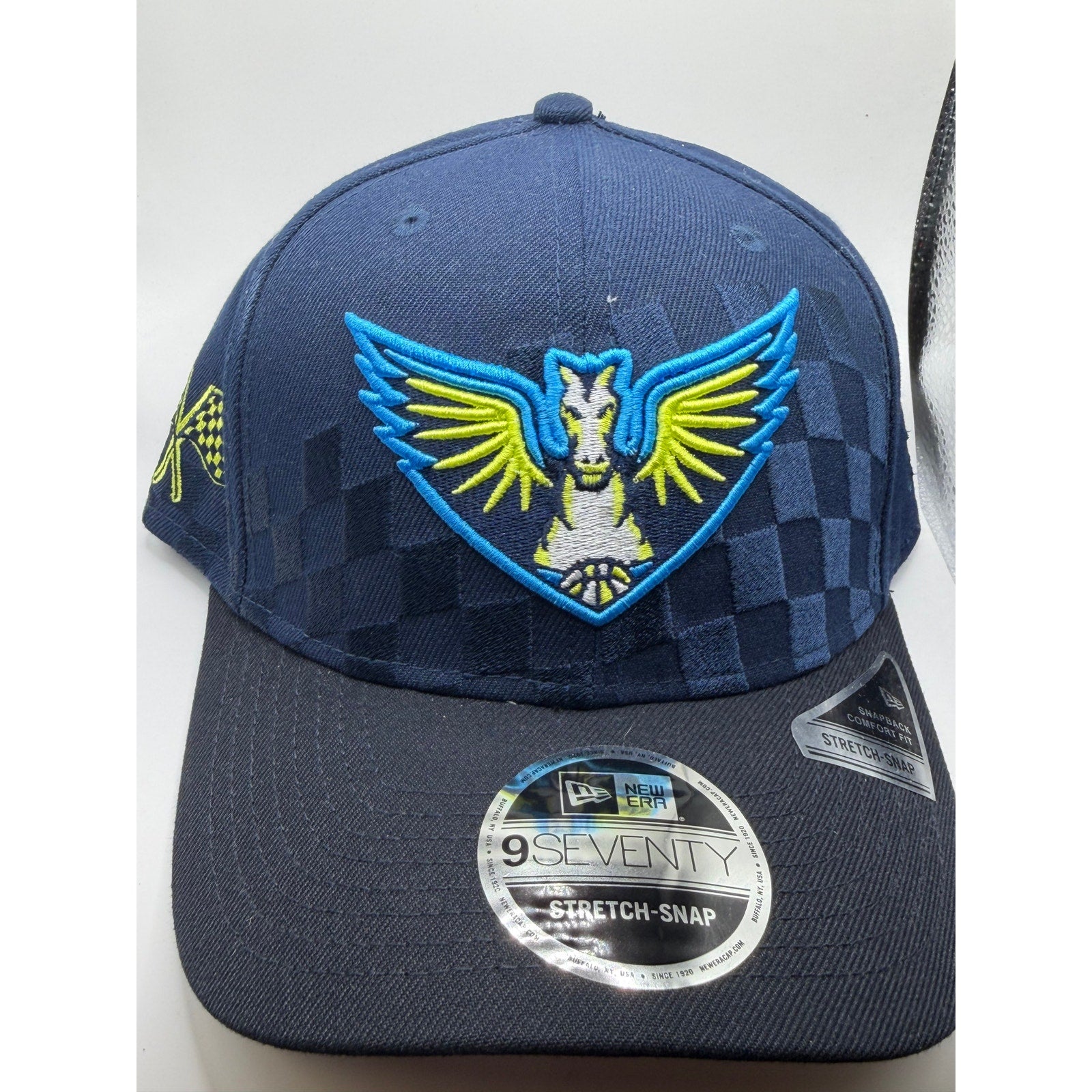New Era Dallas Wings WNBA navy 9SEVENTY stretch-snap hat, front view showing adjustable snapback and team logo.