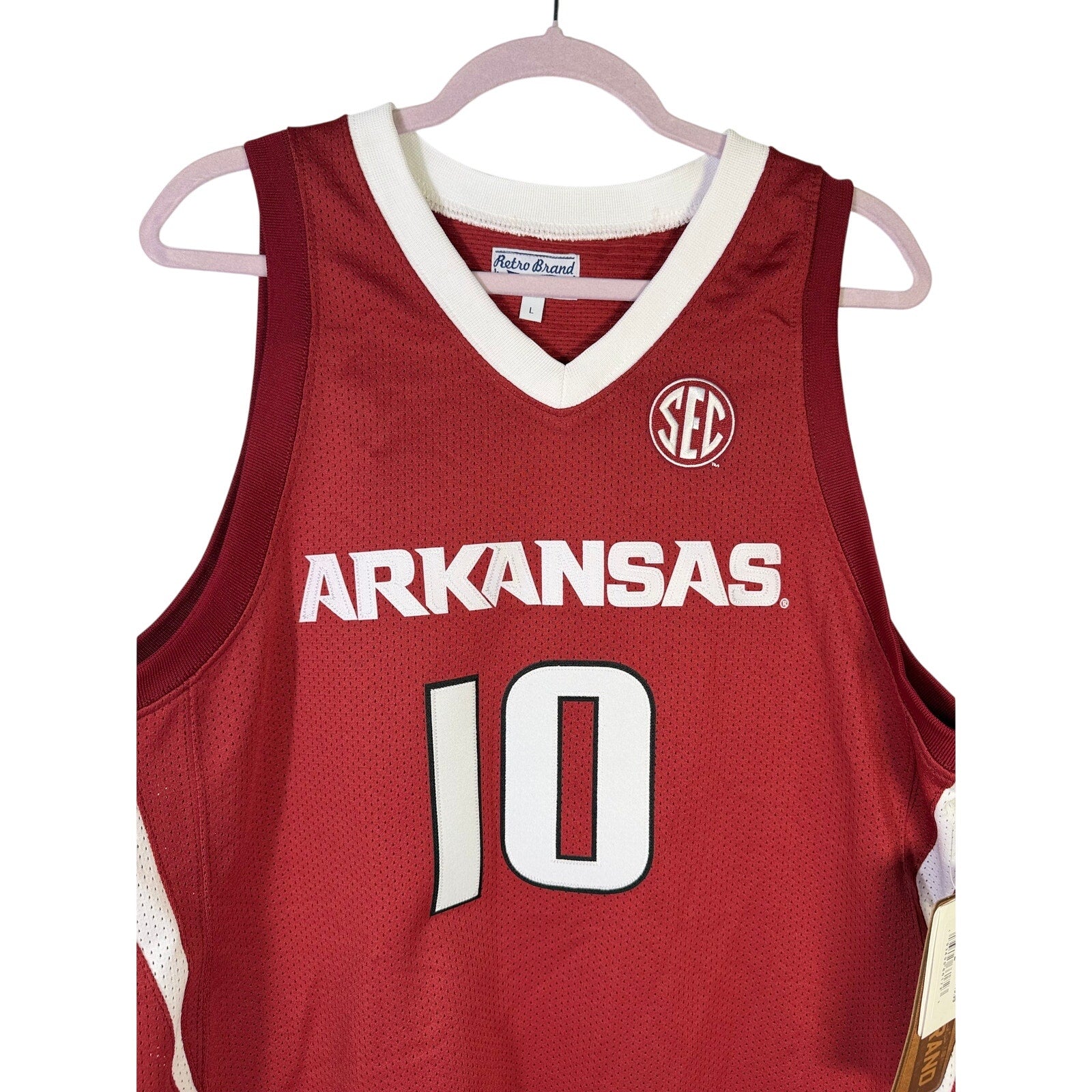Red Retro Brand Arkansas Razorbacks basketball jersey with #10, men's large size, featuring team logo and player number.
