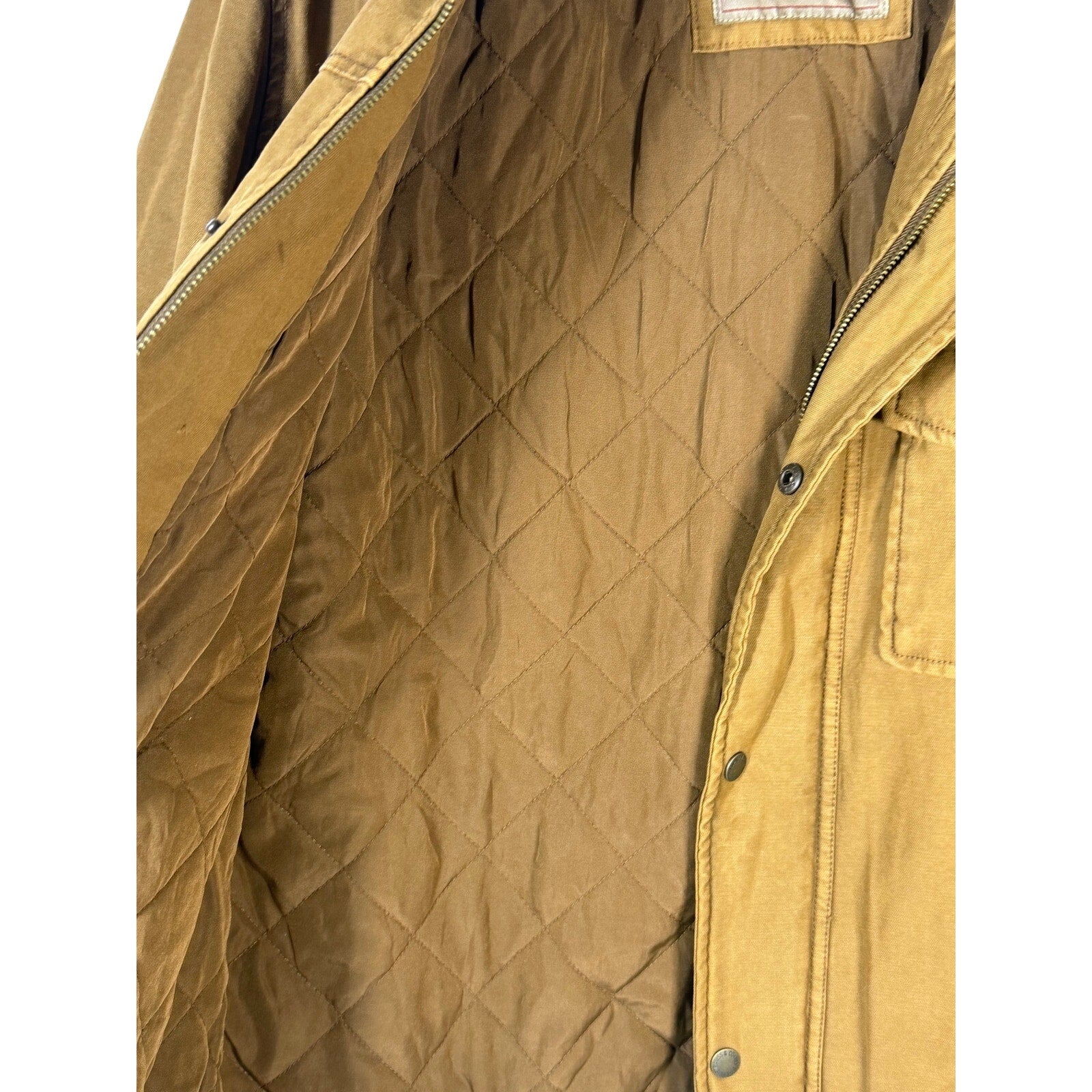 Levi’s men's tan canvas quilted utility field jacket, size medium, new with tags, showing front view with quilted details.