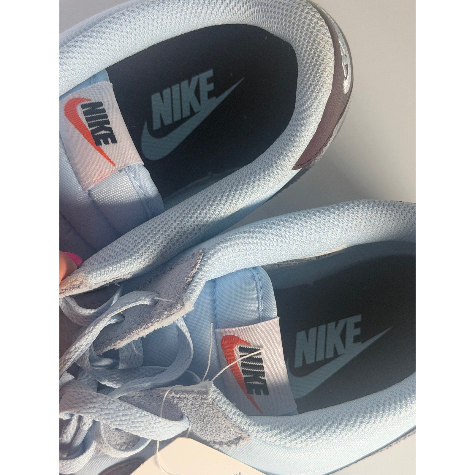 Light blue and burgundy Nike Classic Cortez nylon men's sneakers, size 8.5, featuring a sleek design and iconic branding.