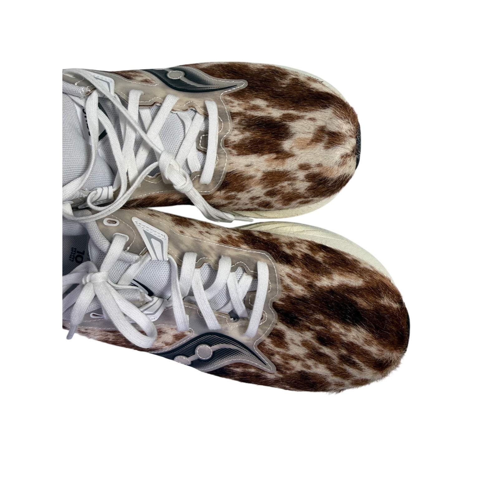 Saucony Women’s Endorphin Shift 3 Runshield cow print athletic running shoes, size 9, with a sleek design and sporty style