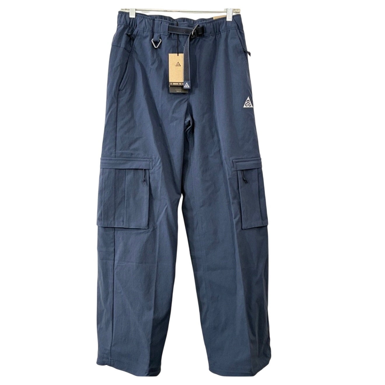 Nike ACG Smith Summit women's cargo pants in thunder blue, size L, featuring multiple pockets and a comfortable fit.