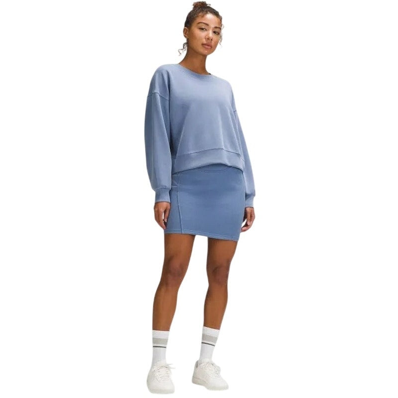 Lululemon women's Softstreme high-rise mini skirt in blue, casual athletic style with a fitted waistband and smooth fabric.