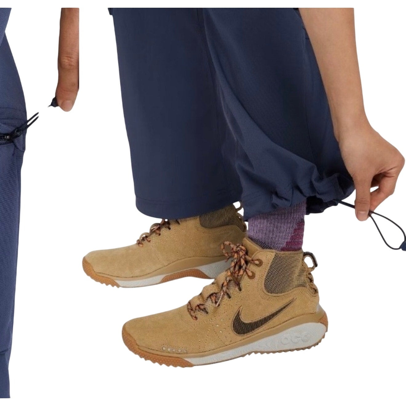 Nike ACG Smith Summit women's cargo pants in thunder blue, size L, featuring multiple pockets and a relaxed fit.