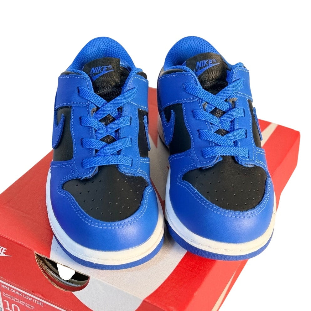 Nike Dunk Low GS sneakers for kids featuring royal blue and black athletic shoes with a stylish design.