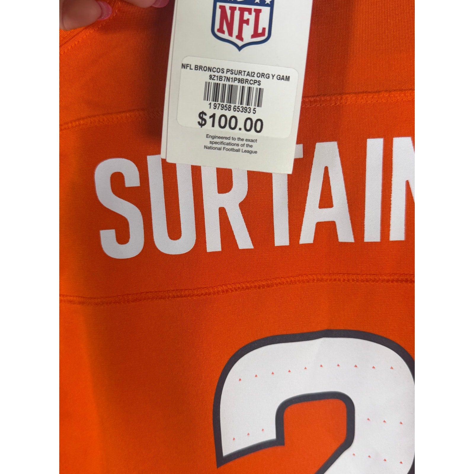 Nike youth Denver Broncos Patrick Surtain II #2 orange game jersey, size L, new with tags, featuring team logo and player number.