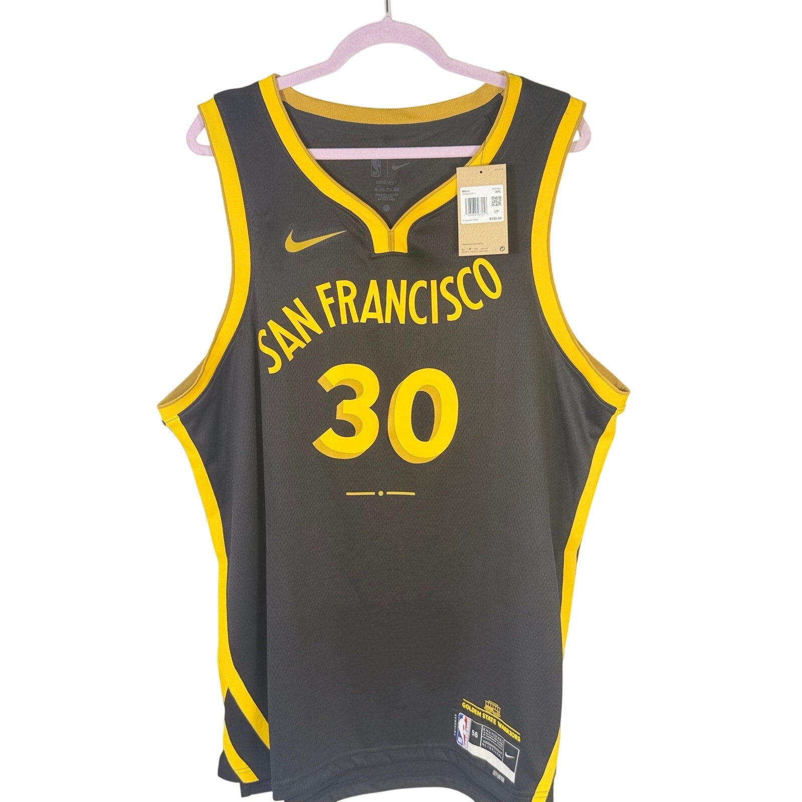 Nike Stephen Curry Golden State Warriors black and yellow men's XXL jersey with team logo and player details.