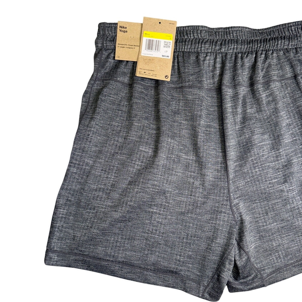 Nike men's gray Dri-FIT yoga shorts with drawstring, lightweight and comfortable for active wear.