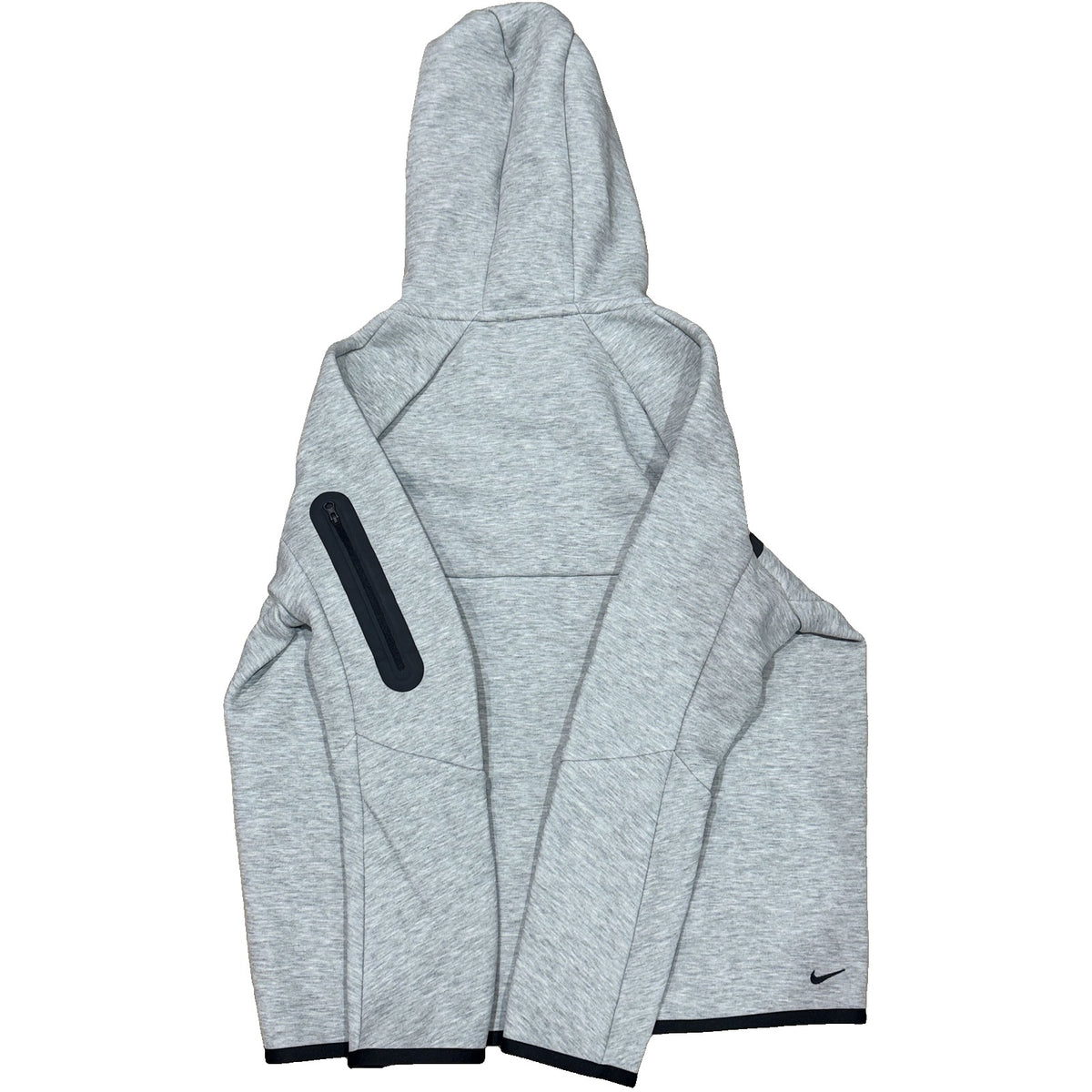 Nike Tech Fleece full-zip hoodie for big kids in dark grey heather, featuring a black Nike logo and front pockets.