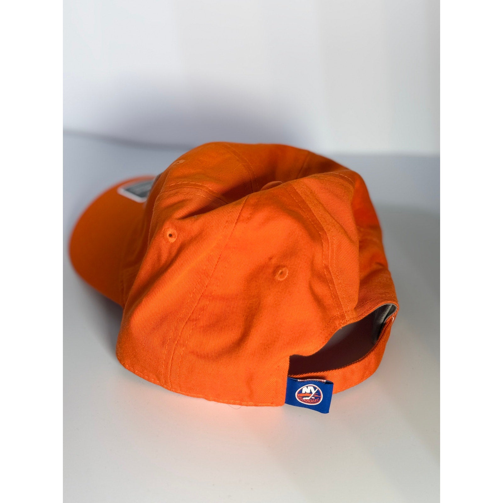 Fanatics New York Islanders orange adjustable dad cap hat, one size, new with embroidered team logo on front.
