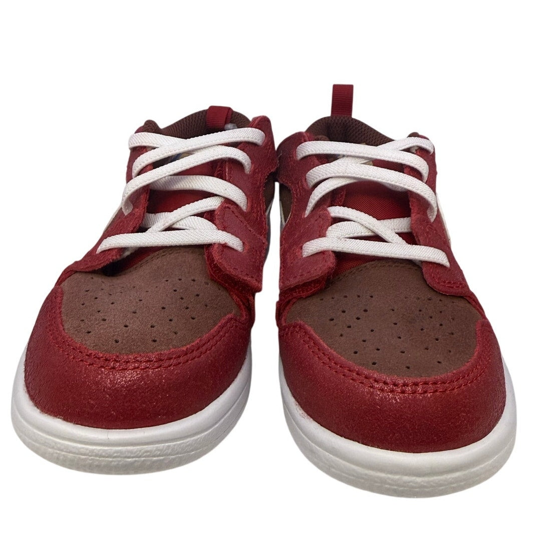 Nike Air Jordan 1 Low Alt SE PS kids' sneakers in Dark Pony and Varsity Red with black accents, featuring the iconic Nike branding.
