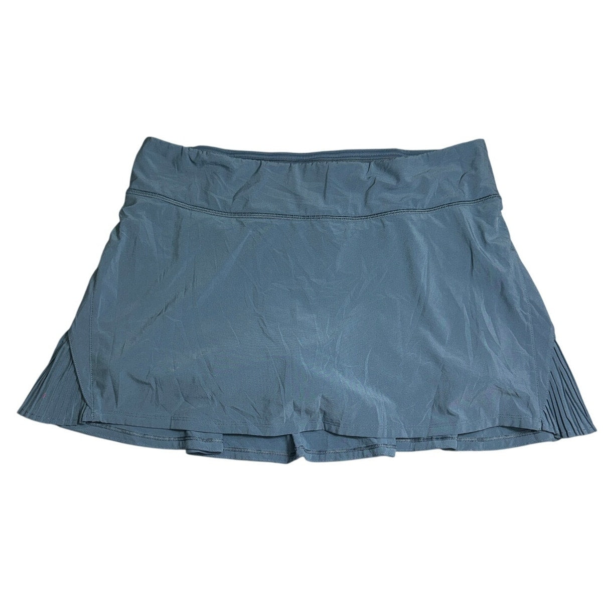 Lululemon Athletica women's ruffle pleated skirt in size 8 with back pocket, featuring a stylish and flowy design.