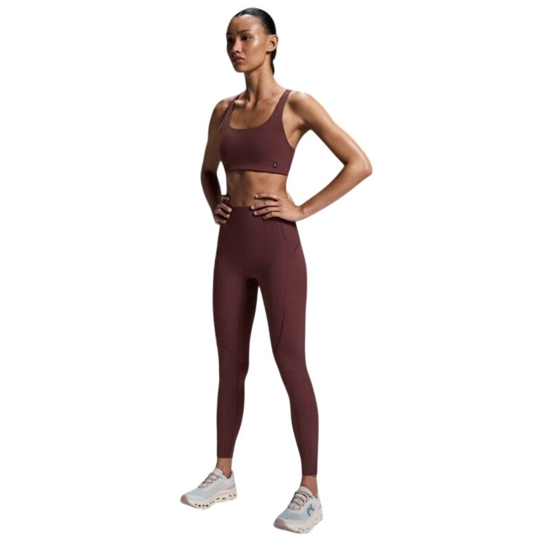 On Running women's small Movement tights in Mulberry, full-length leggings with a comfortable fit and athletic style.