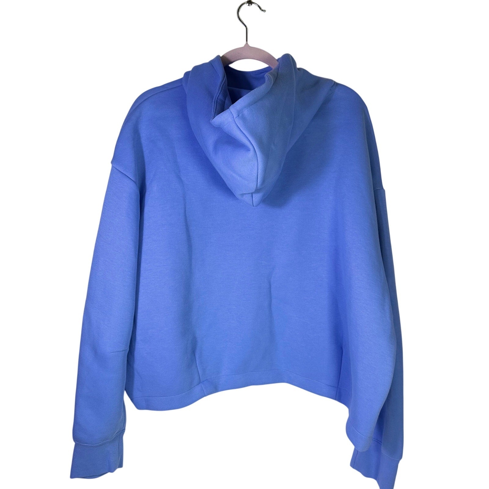 Nike Sportswear women's oversized blue fleece hoodie, size XL, featuring a cozy, relaxed fit and Nike branding.