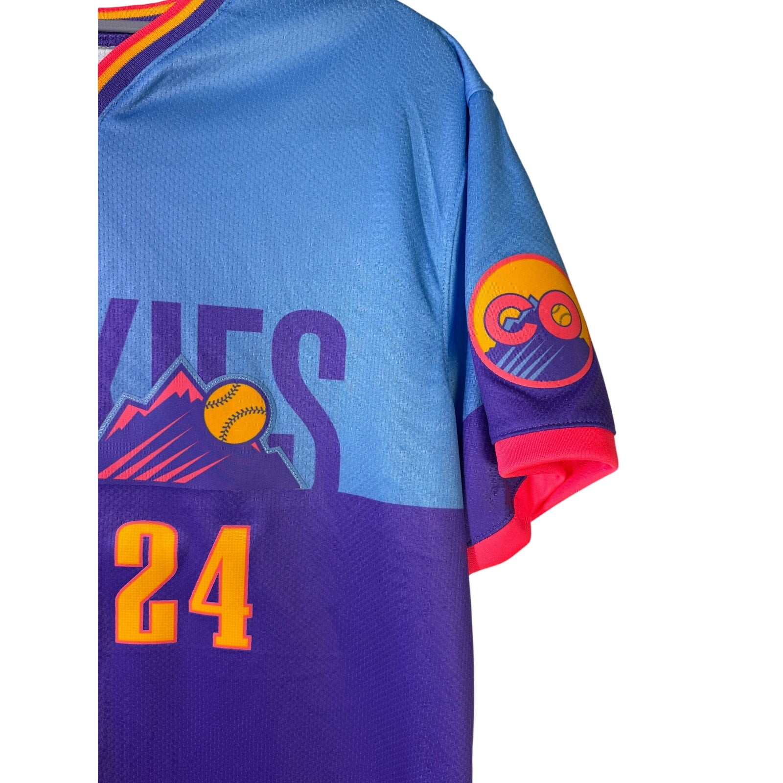 Nike Rockies McMahon #24 City Connect youth jersey in size L 14/16 with team logo and colorful design.