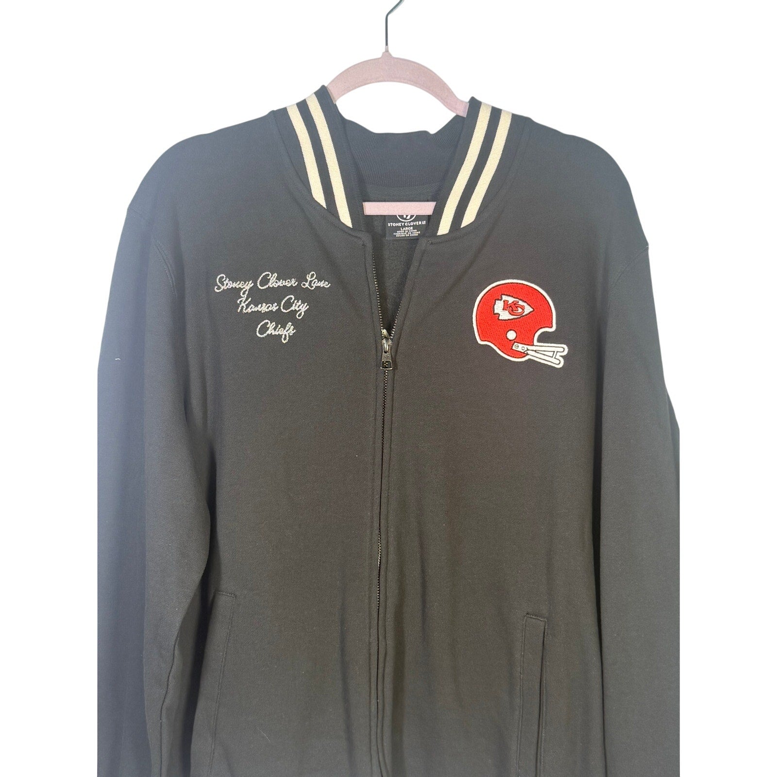 Stoney Clover Kansas City Chiefs women's varsity jacket in black, large size, with team logo and varsity style details.