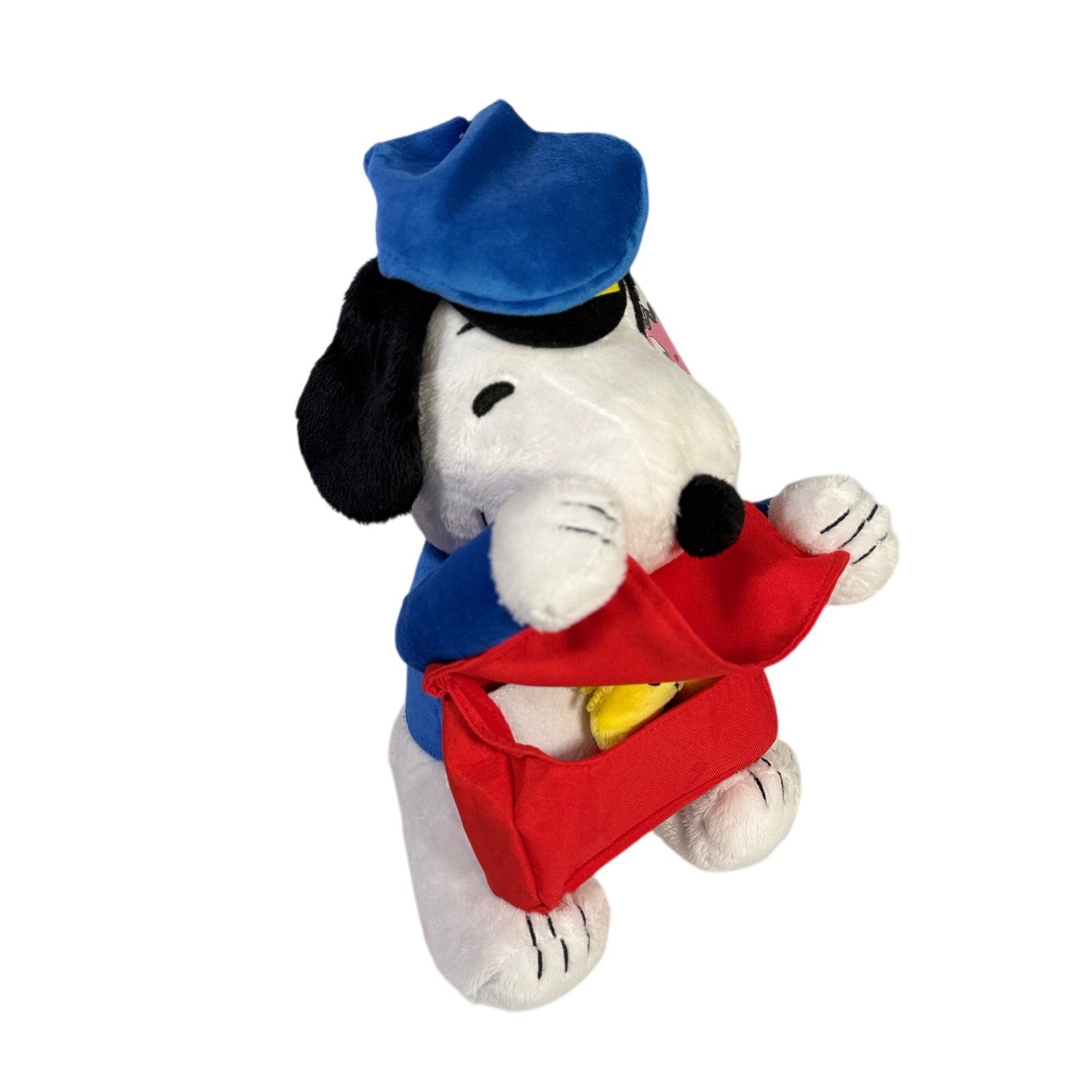 Peanuts Snoopy plush toy dressed as a mail carrier, animated stuffed animal for Valentine's Day, soft and cuddly toy.