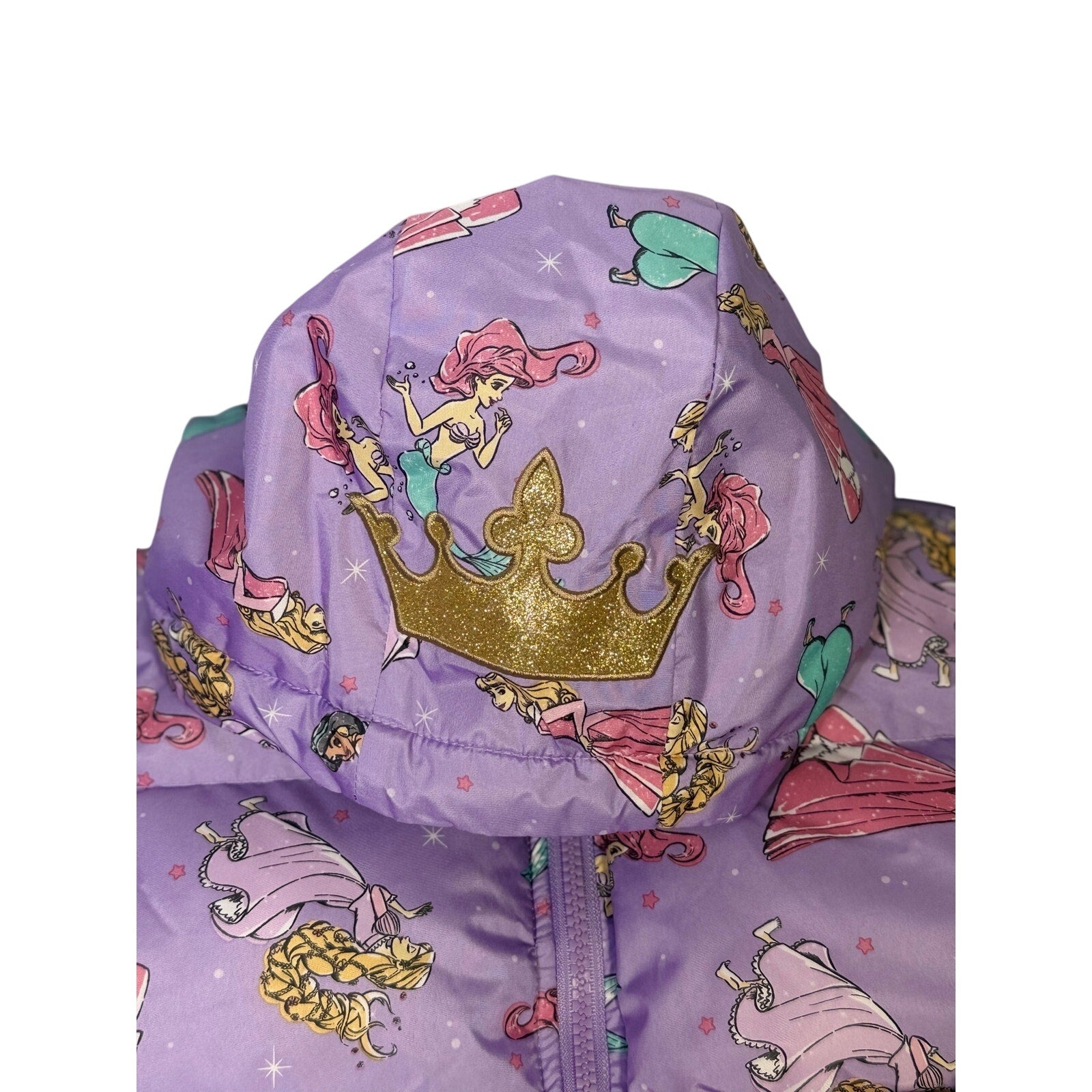 Disney Princess girls' purple hooded puffer jacket in size 5T, featuring a warm, quilted design with princess-themed details.