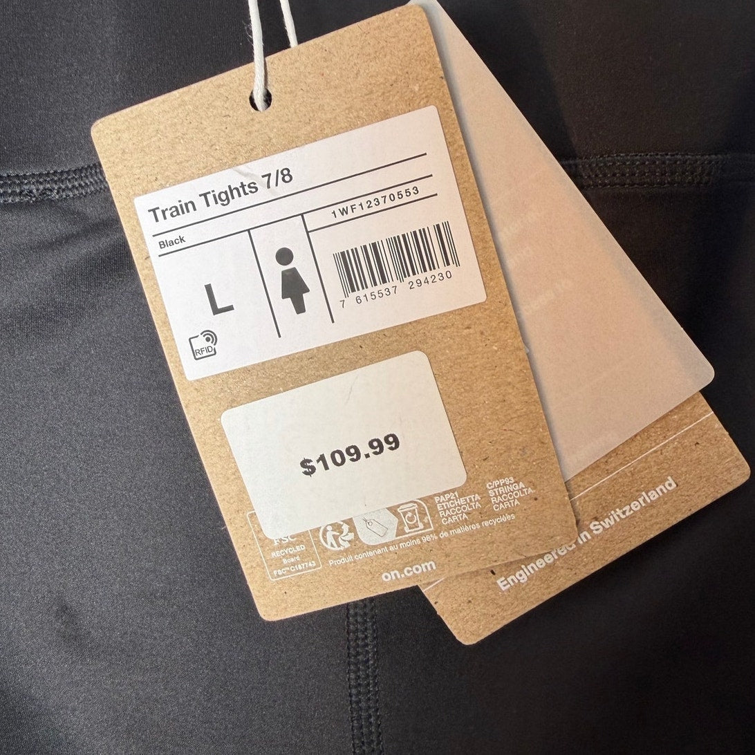 Black On Cloud Active tights for women, large size, close-up of the fitted leggings with seamless design and athletic style.