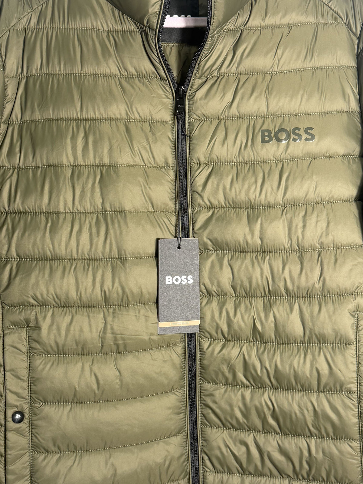 Men's BOSS Hugo Boss Calanos lightweight puffer jacket in open green, size 40R, shown with front view and quilted design.