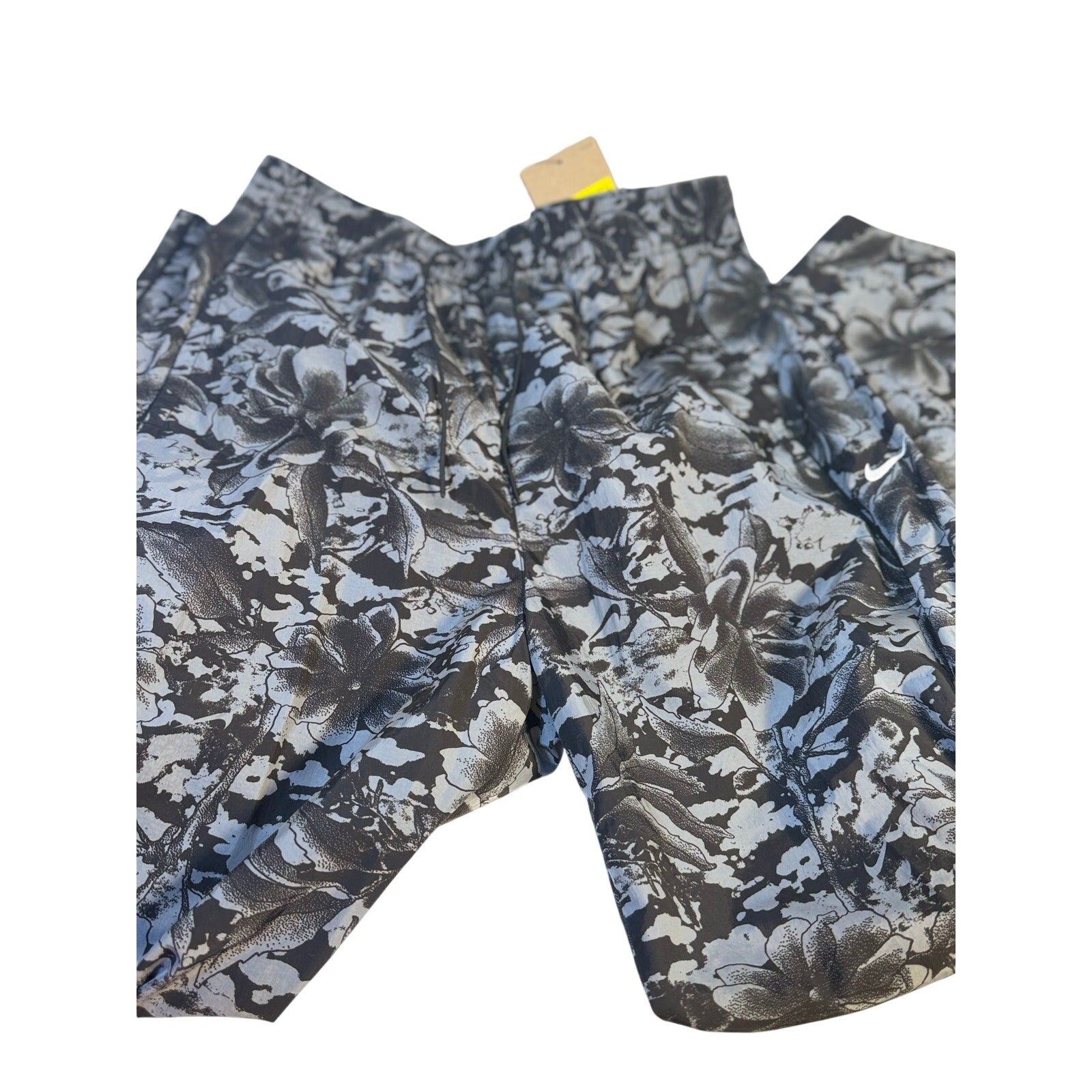 Nike Dri-FIT ADV women's running shorts in black and gray floral print, size small, lightweight athletic shorts for women.