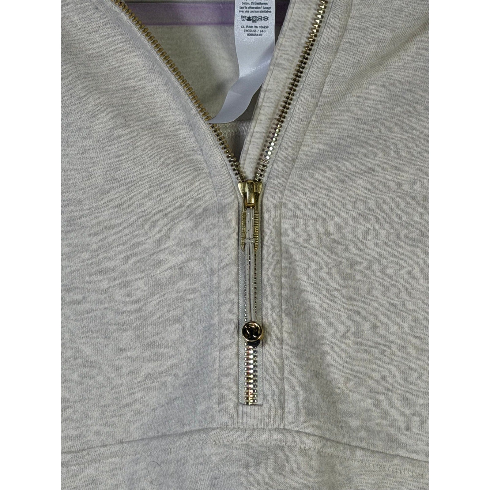 Lululemon Scuba oversized half-zip hoodie in heathered cream, XL/XXL size, with a relaxed fit and soft fabric visible in the image.