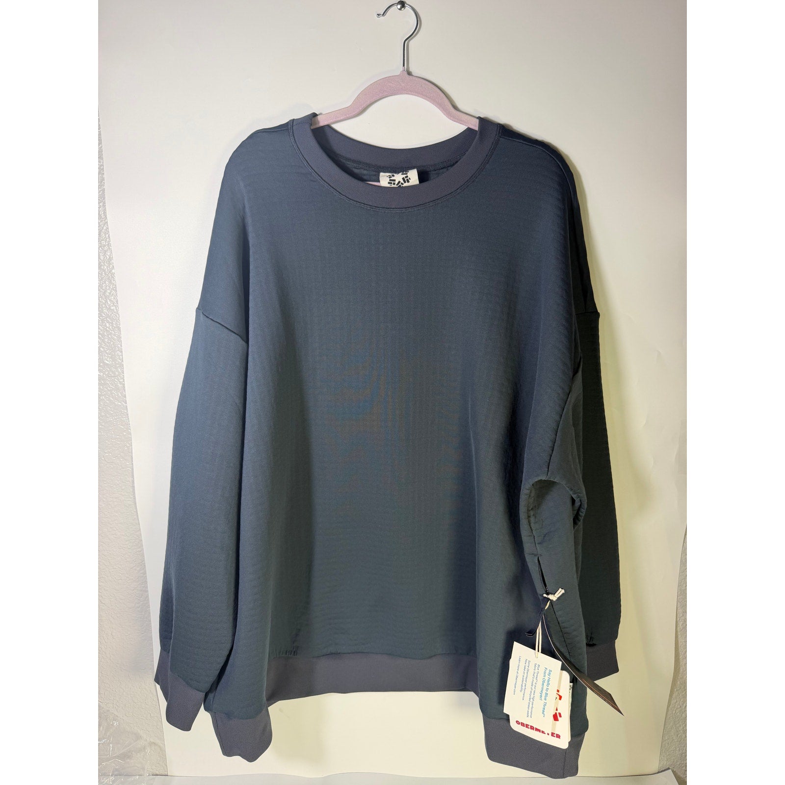 Women's Obermeyer Explorer Tech Crew Pullover Sweatshirt in Blue Nights, shown in 2XL size with a cozy, casual fit.