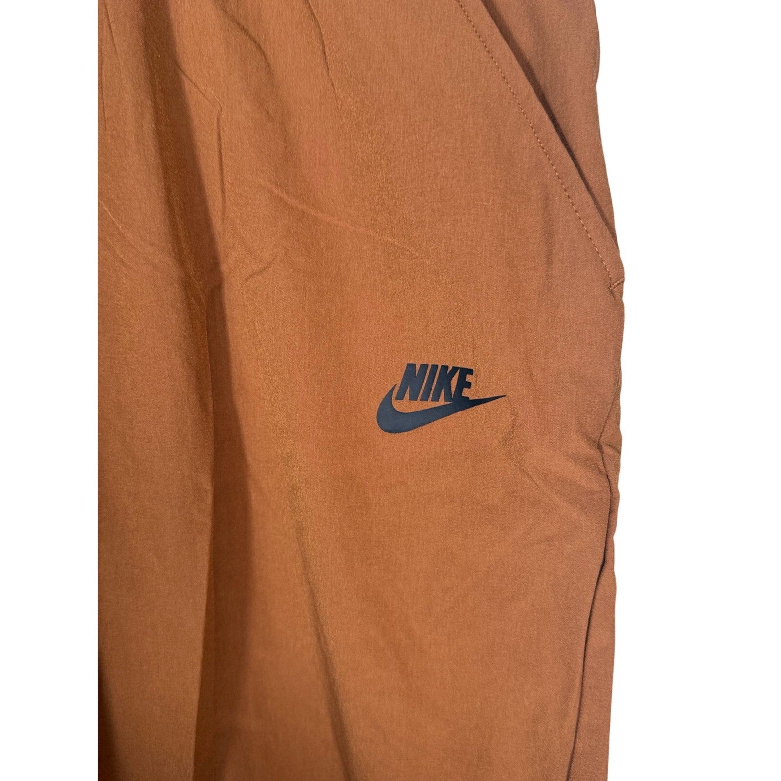 Nike Sportswear men's brown woven pants with elastic waist, size XXL, new with tags.